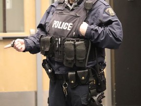 Cst. Braden Marlow speaks to students at J.C. Charyk school on cyber bullying and mental health on Jan. 28, doing their part for Bell's LetsTalk Day which pushes to remove the stigma around mental health issues. Students learned about not only ways to spot someone struggling with mental health issues, but also about being safe on the internet, not just now, but in the future by being aware that their information can be stored for future use. Jackie Irwin/Postmedia