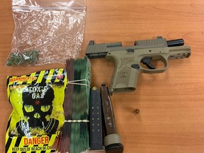 Items, including cash and a handgun, were seized from a vehicle by Ontario Provincial Police on Highway 401 in Napanee on Jan. 29.