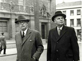 British Prime Minister Harold Macmillan, left, and Canadian Prime Minister John Diefenbaker on Broad Street outside the Sheldonian Theatre in Oxford, U.K., at the University of Oxford in 1960.