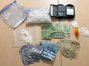 A large quantity of crystal methamphetamine, a quantity of cocaine, hydromorphine pills and cashed were seized by the Kingston Police drug unit on Thursday.