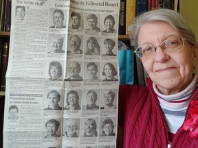 Celebrating her 25th anniversary as a freelance columnist for The Kingston Whig-Standard on Feb. 26, 2021, Susanna McLeod holds a copy of the Community Editorial Board announcement page from Feb. 24, 1996.