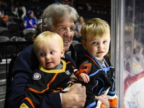 Bob Ferguson, general manager of the American Hockey League's San Diego Gulls, at a recent Gulls game with grandsons Aiden, left, and Caleb.