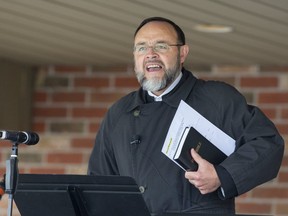 Pastor Henry Hildebrandt delivers a sermon during a drive-in service at The Church of God in Aylmer, Ont. on Sunday May 10, 2020. (Derek Ruttan/The London Free Press)
