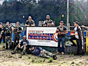 Airsoft enthusiasts pose at the field where they enjoy their hobby. Federal legislation is taking aim at the industry, according to Nipissing Airsoft co-owners Andrew Mitchell and Keegan Tennant.Submitted Photo