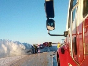 Melfort fire fighters extinguish a fully involved vehicle fire on Feb. 5, northwest of the city. Photo supplied.