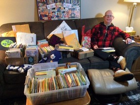 Jason Stewart of Pembroke is all smiles as he works his way through the hundreds of birthday cards that have been arriving since his mom Janet Baird put out a call for birthday wishes to help him celebrate his 50th birthday today, Feb. 3. Janet Baird