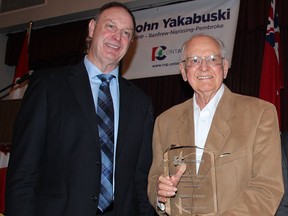 Whitewater Region resident Delbert O'Brien (right) is being inducted into the Ontario Agriculture Hall of Fame. In the photo, back in 2016, Renfrew-Nipissing-Pembroke MPP John Yakabuski honoured O'Brien for his service to the Ontario Progressive Conservative Party with this appreciation award.