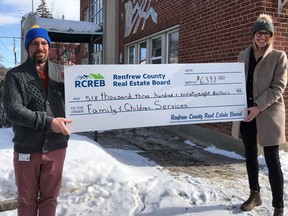 The Renfrew County Real Estate Board recently made a donation of $6,398 to Family and Children's Services of Renfrew County to support families with Care Costs for Children. In the photo from left, Family and Children's Services of Renfrew County staff member Billy Russell, supervisor of the KARe Team (Kinship, Adoption and Resources) and Ainslie MacLeod, services planning coordinator, developmental services.