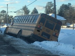 A dash cam photo of the school bus that slid into the ditch off the should of Petawawa Boulevard Wednesay afternoon. None of the 30 students or the driver were injured in the incident and no charges are being laid. The OPP are cautioning drivers about the possibity of snow creating the impression that the shoulder of the road extends further than it actually does.