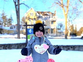 Avaya Chaput stands in front of Seaforth Manor with hearts to hang on their trees. Community members have come together to raise money for Seaforth Manor. Handout