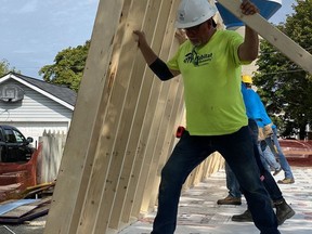 Construction supervisor Serge Gauthier with Habitat for Humanity Sarnia-Lambton works in 2020 on a house on James Street in Petrolia. It was one of several housing projects started by Habitat for Humanity in Sarnia-Lambton last year. (Submitted)
