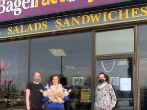 Stephanie Wicks, long-time United Way of Sarnia-Lambton advocate, loads up on bagels from The Bagel Factory/United Way of Sarnia-Lambton March Bagel Madness campaign. Assisting Stephanie with her purchase are Bagel Factory co-owners Melanie Tiggelaar and Michelle Bouchard. One dollar from every dozen bagels sold during the month of March will be donated to the United Way of Sarnia-Lambton. United Way photo/Handout