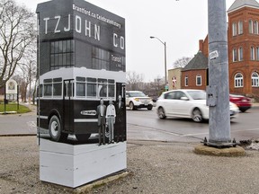 A traffic control box in Brantford is shown wrapped with a photograph as part of an anti-graffiti campaign in the city. A similar initiative is being considered for Sarnia. The Brantford wrap, one of several in the community, features a photo of Fitzjohn Coach of Canada, a bus manufacturer whose plant near the Brantford municipal airport was later acquired by Bluebird. Brian Thompson/Brantford Expositor/Postmedia Network