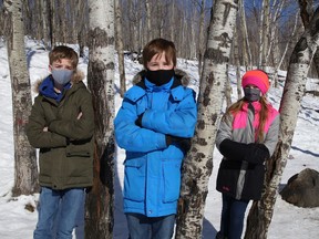 Princess Anne Public School students Talan Schneider, left, David Tompsett and Megan Martin participated in Winter Walk Day at the school in Sudbury, Ont. on Wednesday February 3, 2021. Winter Walk Day is celebrated in schools across Ontario on the first Wednesday of February each year.