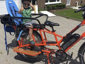 Like the rest of his family, young Henry Klein enjoys biking around Sudbury. Supplied