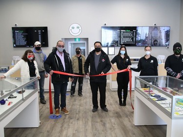 City councillor Bill Leduc and owner John Law cut a ribbon  to officially open Happy Life at 1021 the Kingsway in Sudbury, Ont. on Tuesday February 16, 2021. The business sells wholesale cannabis products. John Lappa/Sudbury Star/Postmedia Network