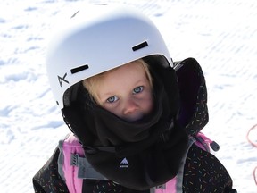 Tori Cuddy, 3, hit the slopes at Adanac Ski Hill in Sudbury, Ont. on Wednesday February 17, 2021. Both Adanac and Lively Ski Hill opened for the season on Wednesday. Operations have been adapted in response to COVID-19. Patrons must book their tickets before arriving at either ski hill, as day tickets will not be available onsite. Those with memberships or punch cards are also required to book ahead. Booking can be done online at www.greatersudbury.ca/leisure. John Lappa/Sudbury Star/Postmedia Network