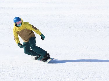 Greg McGarry flies down one of the slopes at Adanac Ski Hill in Sudbury, Ont. on Wednesday February 17, 2021. Both Adanac and Lively Ski Hill opened for the season on Wednesday. Operations have been adapted in response to COVID-19. Patrons must book their tickets before arriving at either ski hill, as day tickets will not be available onsite. Those with memberships or punch cards are also required to book ahead. Booking can be done online at www.greatersudbury.ca/leisure. John Lappa/Sudbury Star/Postmedia Network