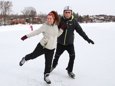 David Hay and his niece, Melissa Covey, ham it up while skating on the Ramsey Lake skating path in Sudbury, Ont. on Friday February 19, 2021. John Lappa/Sudbury Star/Postmedia Network