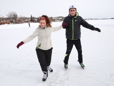 David Hay and his niece, Melissa Covey, ham it up while skating on the Ramsey Lake skating path in Sudbury, Ont. on Friday February 19, 2021. John Lappa/Sudbury Star/Postmedia Network