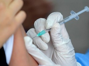 Public Health Sudbury and Districts says the race is on to vaccinate as many people as possible. Photo by RAUL ARBOLEDA/AFP via Getty Images