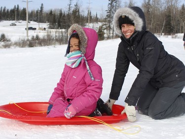 Andrea Ellis Nsiah, was out with her daughter Iris to celebrate Family Day while tobogganing at the Timmins sliding hill on Monday. 

RICHA BHOSALE/The Daily Press