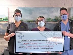 Canadian Medical Association (CMA) Foundation's COVID-19 Community Hospital Fund granted $70,000 to Tillsonburg District Memorial Hospital Foundation, which was presented to TDMH. From left are Sandy Jansen, TDMH President and CEO, and Registered Nurses Stephanie Ballard, Meredith Riches and Darren Ackert, accepting the cheque from Gerry Dearing, Executive Director, TDMH Foundation. (Submitted)