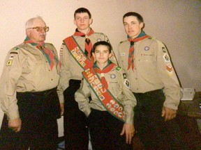 Les Burkholder with three Chief Scouts: Nick Burkholder, George Kydd and Bryan Kydd. The Burkholders have been a mainstay for the 1st Cochrane Scout group for a  decades with Crystal Burkholder now the lead for the group..TP.jpg