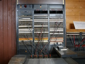 •	IMG_1801 – Just imagine a “Telephone Girl” sitting at this switchboard “listening to voices from everywhere” and conveying news – good and bad – to and from guests of the McNamara Hotel in downtown Peace River. According to records, it was operated at the Mac until 1962.