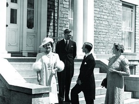 King George VI and Queen Elizabeth, together on the steps at Rideau Hall, are entertained by the governor general, John Buchan, and his wife Susan, during the first-ever visit to Canada by a sitting king and queen. National Film Board of Canada