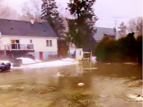 A proposed 17-unit subdivision on the east side of Lynedoch has provoked a discussion over long-standing issues regarding drainage and in-ground water supplies. This photo illustrates some of the ponding problems that arise in the historic village during peak periods such as thaws and heavy rainstorms. – Contributed photo