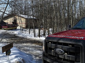 A fire investigator on the scene of an early morning fire that sent two Strathcona County firefighters to hospital at a rural home near Range Road 225A and Township Road 515A in Strathcona County on Wednesday, March 3. ED KAISER/Postmedia