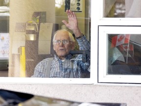 Alf Sauder couuldn't have an in-person 100th birthday party this year, but a lot of people showed up at the Carrot River Care Home on Saturday, February 27 to help celebebrate the milestone with a driveby birthday parade, including some friends from the Carrot River branch of the Royal Canadian Legion. Photo Susan McNeil.