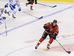 Stockton Heat Adam Ruzicka moves with the puck against Toronto Marlies during a game at Scotiabank Saddledome on Sunday, February 21, 2021.