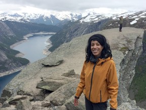 Leila Angrand poses for a photo overlooking a Norwegian fjord.