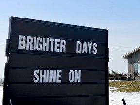 A sign at King's Lock Craft Distillery and Windmill Brewery west of Johnstown offers words of encouragement. (TIM RUHNKE/The Recorder and Times)