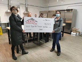 100 Women Who Care Foothills, represented by Julie Boake (left), presented a cheque in the amount of $10,325 to Food for Thought's Suvi-Tuulia Lorenz in High River on  Mar. 10