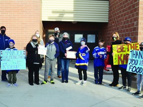 The Leduc Roughnecks U13 1B team made a donation to the Leduc & District Food Bank, Riseup Society Alberta and Karma Concerts on Mar. 5. (Lisa Berg)