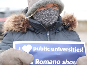Debbie Ladd participates in a demonstration outside Minister of Colleges and Universities Ross Romano's constituency office on Thursday, March 11, 2021 in Sault Ste. Marie, Ont. Demonstrators want Romano to support Laurentian University. The post-secondary institution is in creditor protection. (BRIAN KELLY/THE SAULT STAR/POSTMEDIA NETWORK)