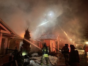Firefighters battle a blaze Tuesday night at the New Rideau Restaurant near Kemptville. (SUBMITTED PHOTO BY OTTAWA FIRE SERVICES)