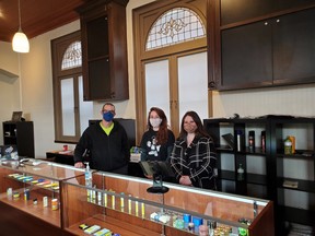 VIP Cannabis Company budtenders Emanuel Salvador, Meaghen Longmire and Sierra Morton inside Hanover’s first legal brick-and-mortar cannabis shop.