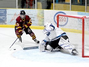 Timmins Rock forward Harry Clark puts on the brakes to cut in front of Cochrane Crunch goalie Michael Nickolau during the second period of Friday night’s NOJHL contest at the Tim Horton Event Centre. While Clark was able to get off a shot, Nickolau was able to get a pad in front of it to deflect the puck past the post. Clark did score a third-period goal, however, as the Rock went on to roll over the Crunch 9-1. THOMAS PERRY/THE DAILY PRESS