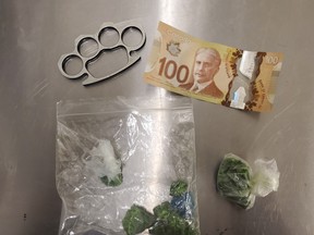 Ontario Provincial Police seized approximately $18,000 worth of fentanyl and a prohibited weapon following an arrest, March 15, in Sturgeon Falls. Ontario Provincial Police Photo