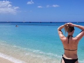 One of Nadine Robinson’s favourite beach activities is soaking up some vitamin D while admiring the postcard like ocean and skyscapes.