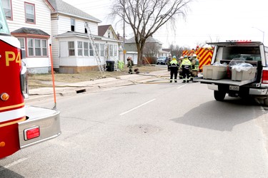 Firefighters and paramedics respond to a blaze at 218 Gloucester St., in Sault Ste. Marie, Ont., on Tuesday, March 30, 2021.  (BRIAN KELLY/THE SAULT STAR/POSTMEDIA NETWORK)