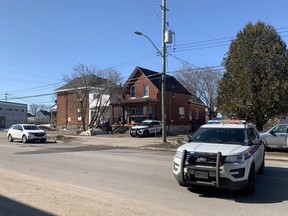 North Bay police are seen on Second Avenue W., Sunday morning, across the street from Mother St. Bride Catholic Elementary School following a fire. The fire is being investigated as arson and police say an adult male has been taken into custody. Jennifer Hamilton-McCharles/The Nugget