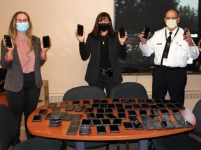 West Region OPP announced Tuesday a donation of cellphones to 11 Victim Services agencies in Southwestern Ontario. From left: Ashley Anderson, OPP West Region headquarters administrative assistant, Staff Sgt. Victoria Loucks, and Chief Supt. Dwight Thib. (Contributed photo)