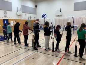 Devon's RCMP detachment commander Sgt. Chris Mosley visited the students at local schools, as well as Riverview Middle School to check out their archery program.
(Supplied by Devon RCMP)