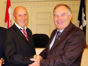 Former Ward 1 Coun. Noel Haydt, left, shares a laugh with former Norfolk Mayor Charlie Luke during one of the last council meetings Haydt attended at the end of his term in 2018. Haydt did not stand for re-election in 2018 but recently filed nomination papers for the county by-election in Langton-area Ward 2. – Monte Sonnenberg