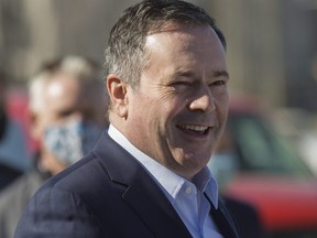 Premier Jason Kenney following a press conference where he provided an update on the distribution of COVID-19 vaccines through participating community pharmacies, in Edmonton Thursday March 18, 2021.